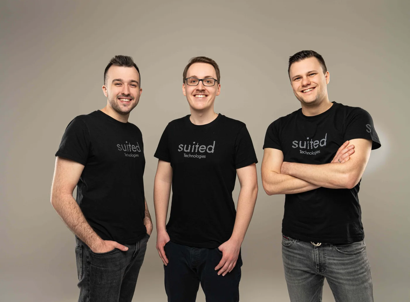 Suited Technologies team members in professional studio setting